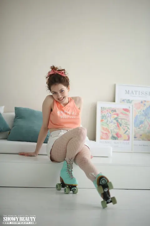 Woman Pulls Off Roller Skates and Strips Out of Her Shorts – photo 1 of 20