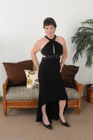Short-Haired Mature Woman Undresses to Heels and Fingers Herself
